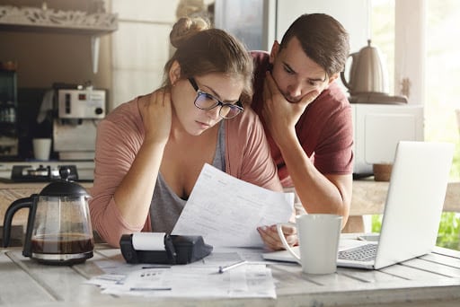 couple researching cabinet materials